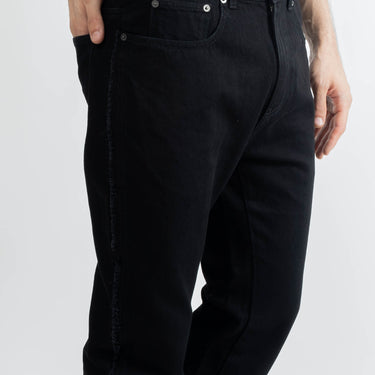 JW Anderson Twisted Slim Fit Jeans In Black